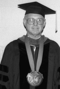 Dr. James P. Long with inaugural regalia, including the CTC medallion.